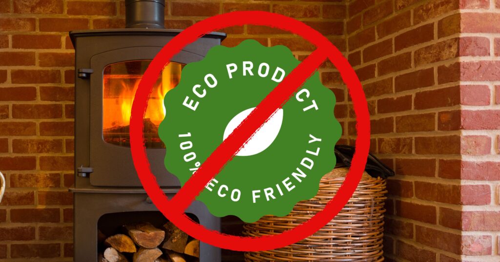 A red forbidden symbol is on top of a label that says “Eco product, 100% eco friendly.” A photo of a lit modern wood stove is in the background.